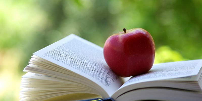 Red apple on a book